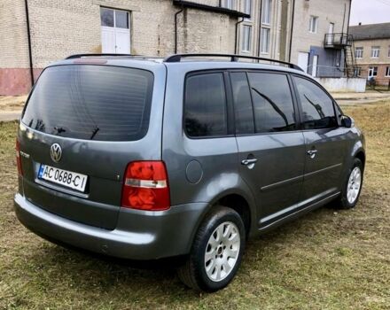 Серый Фольксваген Туран, объемом двигателя 2 л и пробегом 350 тыс. км за 5499 $, фото 4 на Automoto.ua