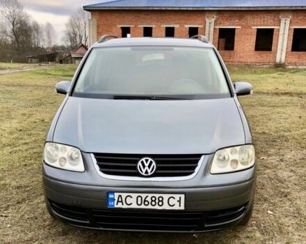 Серый Фольксваген Туран, объемом двигателя 2 л и пробегом 350 тыс. км за 5499 $, фото 2 на Automoto.ua