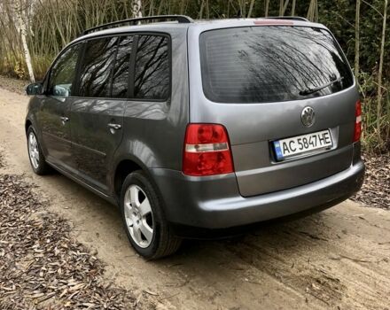 Серый Фольксваген Туран, объемом двигателя 1.9 л и пробегом 300 тыс. км за 5499 $, фото 4 на Automoto.ua