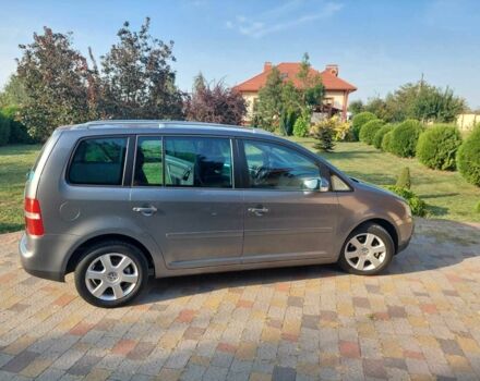 Сірий Фольксваген Туран, об'ємом двигуна 1.9 л та пробігом 185 тис. км за 7400 $, фото 2 на Automoto.ua