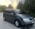 Серый Фольксваген Туран, объемом двигателя 2 л и пробегом 270 тыс. км за 5200 $, фото 1 на Automoto.ua