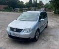 Сірий Фольксваген Туран, об'ємом двигуна 1.6 л та пробігом 195 тис. км за 5600 $, фото 1 на Automoto.ua