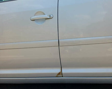 Серый Фольксваген Туран, объемом двигателя 2 л и пробегом 259 тыс. км за 5600 $, фото 19 на Automoto.ua