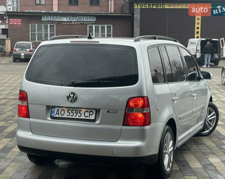 Серый Фольксваген Туран, объемом двигателя 1.9 л и пробегом 290 тыс. км за 4600 $, фото 4 на Automoto.ua