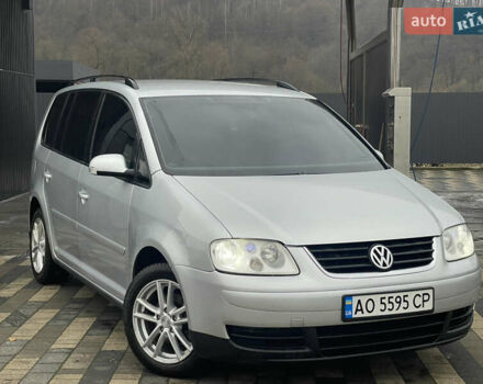 Серый Фольксваген Туран, объемом двигателя 1.9 л и пробегом 290 тыс. км за 4600 $, фото 2 на Automoto.ua