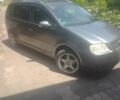 Сірий Фольксваген Туран, об'ємом двигуна 2 л та пробігом 280 тис. км за 7200 $, фото 1 на Automoto.ua