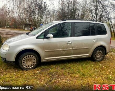 Серый Фольксваген Туран, объемом двигателя 1.9 л и пробегом 365 тыс. км за 5500 $, фото 2 на Automoto.ua