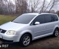 Сірий Фольксваген Туран, об'ємом двигуна 1.6 л та пробігом 285 тис. км за 6500 $, фото 1 на Automoto.ua