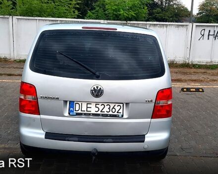 Серый Фольксваген Туран, объемом двигателя 1.9 л и пробегом 231 тыс. км за 2700 $, фото 2 на Automoto.ua