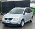 Сірий Фольксваген Туран, об'ємом двигуна 2 л та пробігом 315 тис. км за 4700 $, фото 1 на Automoto.ua