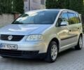 Серый Фольксваген Туран, объемом двигателя 1.6 л и пробегом 250 тыс. км за 3950 $, фото 1 на Automoto.ua