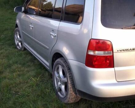 Серый Фольксваген Туран, объемом двигателя 1.9 л и пробегом 297 тыс. км за 5500 $, фото 4 на Automoto.ua