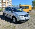 Сірий Фольксваген Туран, об'ємом двигуна 2 л та пробігом 277 тис. км за 4990 $, фото 1 на Automoto.ua