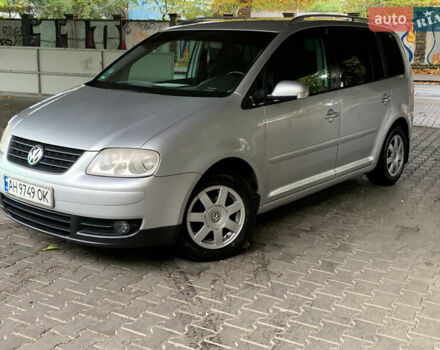 Серый Фольксваген Туран, объемом двигателя 2 л и пробегом 298 тыс. км за 6750 $, фото 1 на Automoto.ua