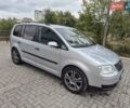 Серый Фольксваген Туран, объемом двигателя 1.9 л и пробегом 370 тыс. км за 6990 $, фото 1 на Automoto.ua