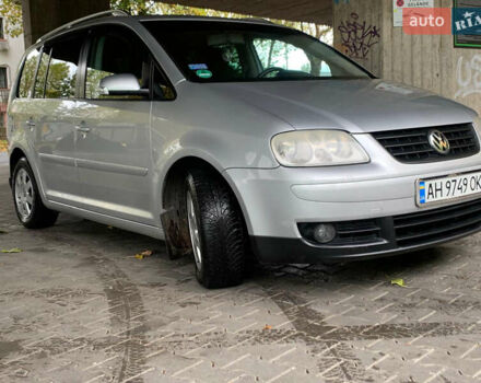 Серый Фольксваген Туран, объемом двигателя 2 л и пробегом 298 тыс. км за 6750 $, фото 2 на Automoto.ua