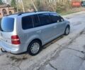 Серый Фольксваген Туран, объемом двигателя 1.6 л и пробегом 210 тыс. км за 4100 $, фото 1 на Automoto.ua