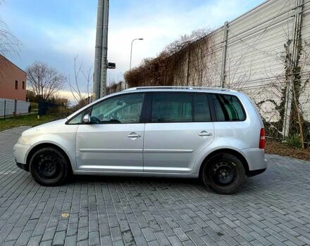 Сірий Фольксваген Туран, об'ємом двигуна 2 л та пробігом 300 тис. км за 2700 $, фото 4 на Automoto.ua