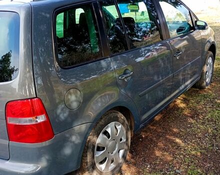 Серый Фольксваген Туран, объемом двигателя 1.6 л и пробегом 198 тыс. км за 6200 $, фото 1 на Automoto.ua