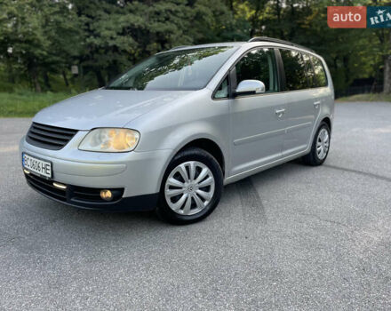 Серый Фольксваген Туран, объемом двигателя 1.98 л и пробегом 231 тыс. км за 4450 $, фото 1 на Automoto.ua