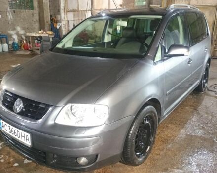 Сірий Фольксваген Туран, об'ємом двигуна 2 л та пробігом 286 тис. км за 4700 $, фото 4 на Automoto.ua