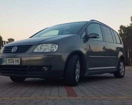 Серый Фольксваген Туран, объемом двигателя 1.98 л и пробегом 219 тыс. км за 5300 $, фото 2 на Automoto.ua