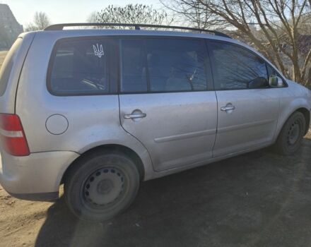 Серый Фольксваген Туран, объемом двигателя 2 л и пробегом 378 тыс. км за 2600 $, фото 2 на Automoto.ua