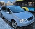 Серый Фольксваген Туран, объемом двигателя 2 л и пробегом 230 тыс. км за 5000 $, фото 1 на Automoto.ua