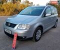 Сірий Фольксваген Туран, об'ємом двигуна 1.6 л та пробігом 213 тис. км за 5800 $, фото 1 на Automoto.ua