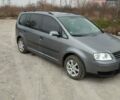 Серый Фольксваген Туран, объемом двигателя 1.6 л и пробегом 180 тыс. км за 4800 $, фото 1 на Automoto.ua