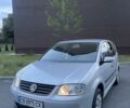 Серый Фольксваген Туран, объемом двигателя 1.6 л и пробегом 230 тыс. км за 4950 $, фото 1 на Automoto.ua
