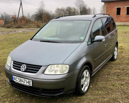 Серый Фольксваген Туран, объемом двигателя 1.9 л и пробегом 300 тыс. км за 5300 $, фото 1 на Automoto.ua