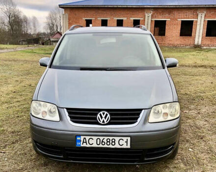 Серый Фольксваген Туран, объемом двигателя 1.97 л и пробегом 350 тыс. км за 5500 $, фото 2 на Automoto.ua