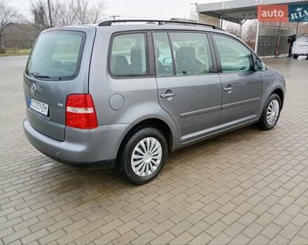Серый Фольксваген Туран, объемом двигателя 1.6 л и пробегом 238 тыс. км за 4299 $, фото 5 на Automoto.ua