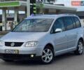 Серый Фольксваген Туран, объемом двигателя 1.6 л и пробегом 223 тыс. км за 5500 $, фото 1 на Automoto.ua