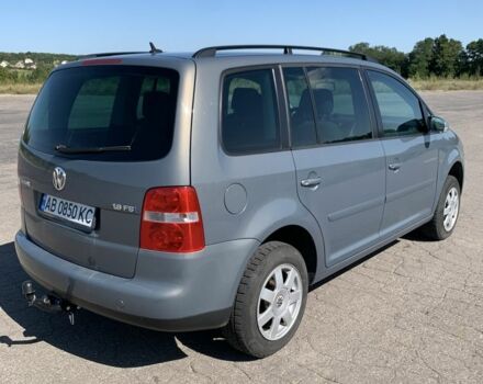 Серый Фольксваген Туран, объемом двигателя 1.6 л и пробегом 234 тыс. км за 6100 $, фото 2 на Automoto.ua