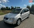 Серый Фольксваген Туран, объемом двигателя 2 л и пробегом 260 тыс. км за 5700 $, фото 1 на Automoto.ua
