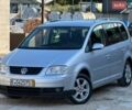Серый Фольксваген Туран, объемом двигателя 1.6 л и пробегом 223 тыс. км за 5555 $, фото 1 на Automoto.ua