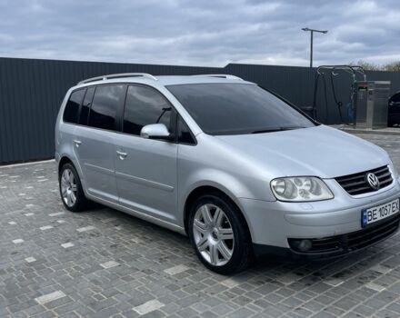 Серый Фольксваген Туран, объемом двигателя 2 л и пробегом 320 тыс. км за 6299 $, фото 1 на Automoto.ua