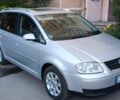 Серый Фольксваген Туран, объемом двигателя 1.6 л и пробегом 238 тыс. км за 5450 $, фото 1 на Automoto.ua
