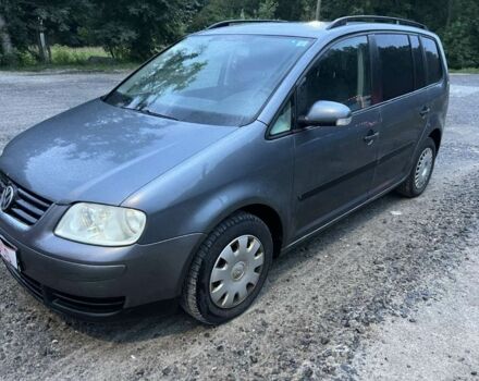 Серый Фольксваген Туран, объемом двигателя 1.9 л и пробегом 1 тыс. км за 2200 $, фото 1 на Automoto.ua