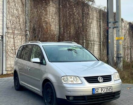 Сірий Фольксваген Туран, об'ємом двигуна 2 л та пробігом 300 тис. км за 2700 $, фото 1 на Automoto.ua