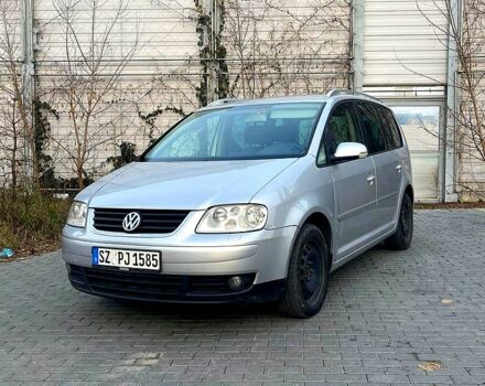 Сірий Фольксваген Туран, об'ємом двигуна 2 л та пробігом 300 тис. км за 2700 $, фото 2 на Automoto.ua