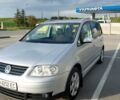 Серый Фольксваген Туран, объемом двигателя 2 л и пробегом 263 тыс. км за 5000 $, фото 1 на Automoto.ua