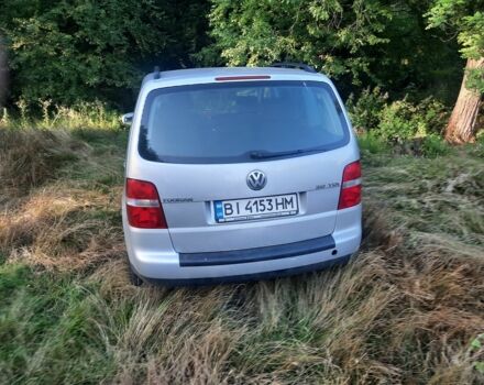 Серый Фольксваген Туран, объемом двигателя 2 л и пробегом 300 тыс. км за 4800 $, фото 2 на Automoto.ua