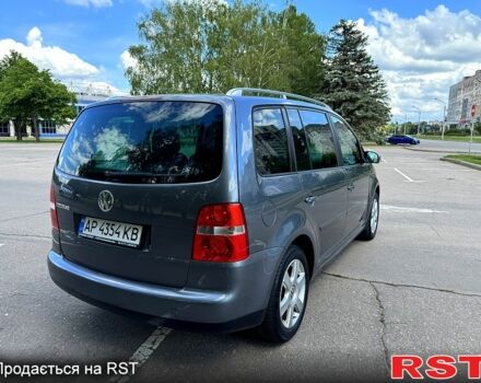 Сірий Фольксваген Туран, об'ємом двигуна 1.6 л та пробігом 239 тис. км за 5400 $, фото 3 на Automoto.ua