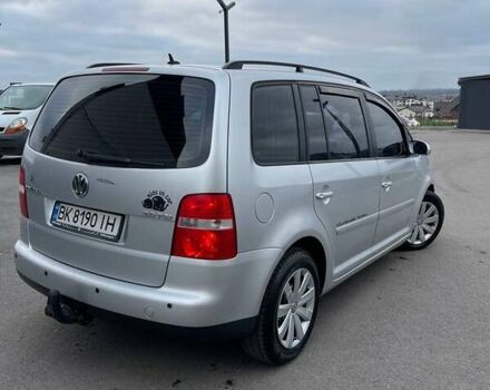 Серый Фольксваген Туран, объемом двигателя 2 л и пробегом 296 тыс. км за 4999 $, фото 7 на Automoto.ua