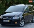 Серый Фольксваген Туран, объемом двигателя 1.6 л и пробегом 230 тыс. км за 5750 $, фото 1 на Automoto.ua