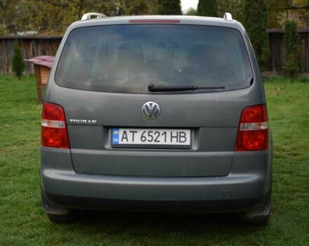 Серый Фольксваген Туран, объемом двигателя 2 л и пробегом 370 тыс. км за 4950 $, фото 2 на Automoto.ua
