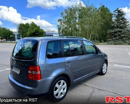 Сірий Фольксваген Туран, об'ємом двигуна 1.6 л та пробігом 239 тис. км за 5400 $, фото 6 на Automoto.ua